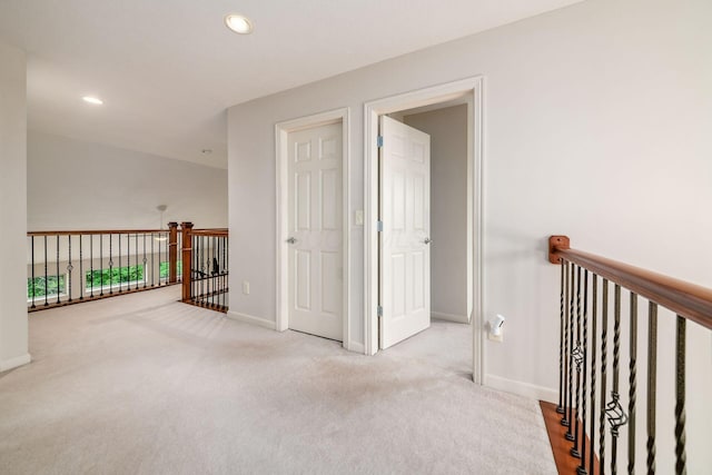 7019 Blakemore Ln, Dublin, OH 43016 - hallway featuring baseboards, carpet flooring, an upstairs landing, and recessed lighting