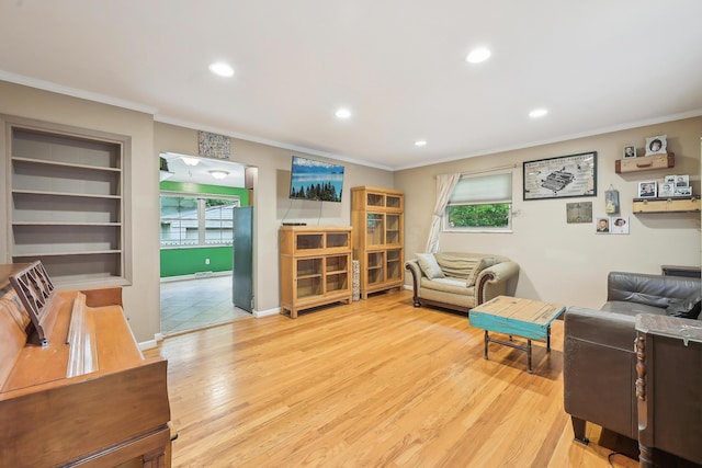 316 Westview Ave, Columbus, OH 43214 - living area featuring crown molding, recessed lighting, wood finished floors, plenty of natural light, and baseboards
