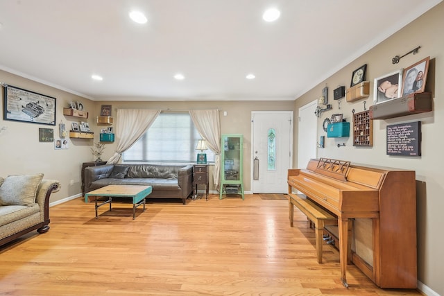 316 Westview Ave, Columbus, OH 43214 - living area with light wood finished floors, crown molding, recessed lighting, and baseboards