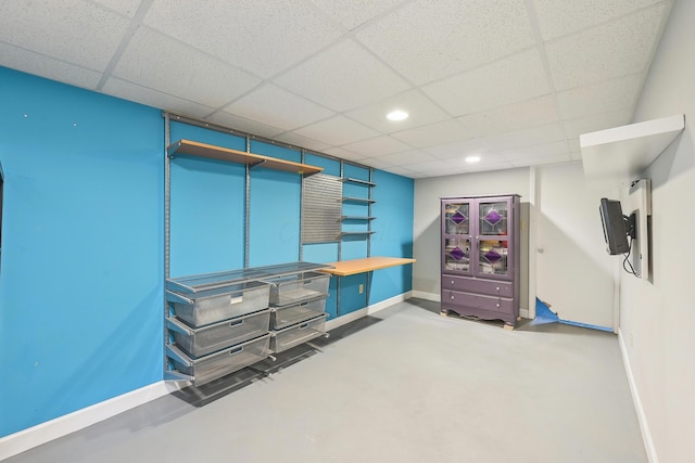316 Westview Ave, Columbus, OH 43214 - below grade area featuring baseboards, a paneled ceiling, and recessed lighting