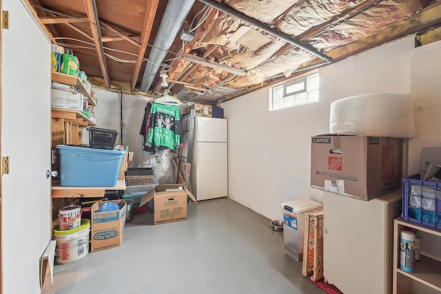 316 Westview Ave, Columbus, OH 43214 - below grade area featuring freestanding refrigerator and concrete block wall