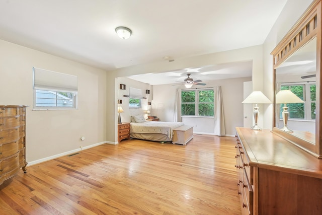 316 Westview Ave, Columbus, OH 43214 - bedroom with multiple windows, light wood finished floors, baseboards, and a ceiling fan
