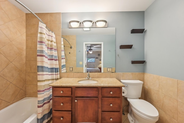 316 Westview Ave, Columbus, OH 43214 - full bath featuring tile walls, ceiling fan, toilet, shower / bath combo, and vanity