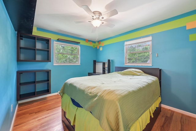 316 Westview Ave, Columbus, OH 43214 - bedroom with wood finished floors, baseboards, and ceiling fan