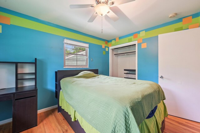 316 Westview Ave, Columbus, OH 43214 - bedroom featuring wood finished floors, a closet, ceiling fan, and baseboards