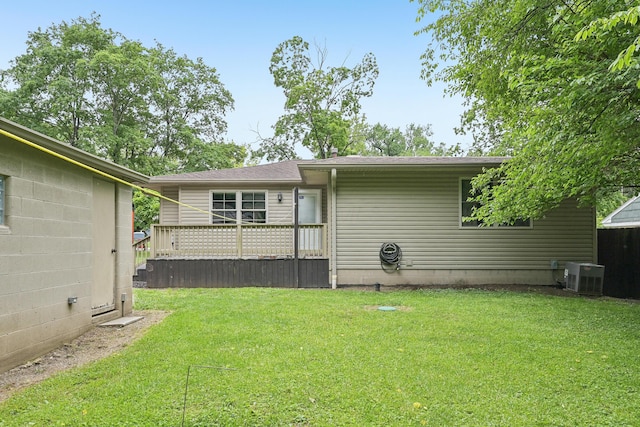 316 Westview Ave, Columbus, OH 43214 - rear view of property with central AC unit, a yard, a wooden deck, and a shingled roof