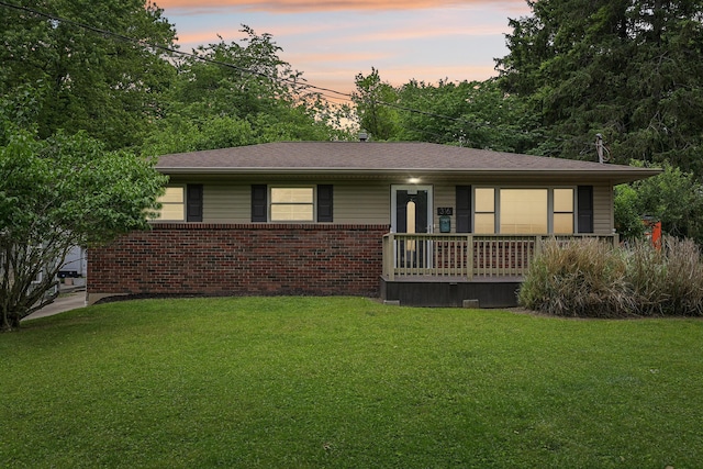 316 Westview Ave, Columbus, OH 43214 - ranch-style house with a front yard, brick siding, and covered porch