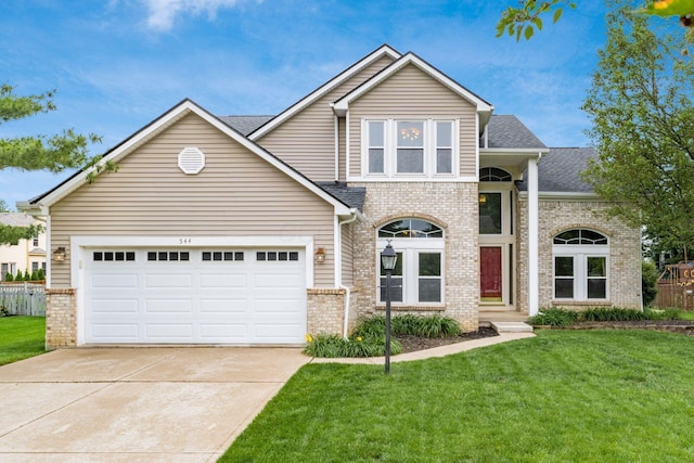 544 Courtright Ct, Pickerington, OH 43147 - view of front facade with brick siding, driveway, roof with shingles, and a garage