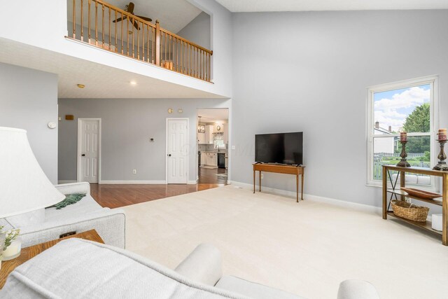 544 Courtright Ct, Pickerington, OH 43147 - living room with a high ceiling, baseboards, and wood finished floors