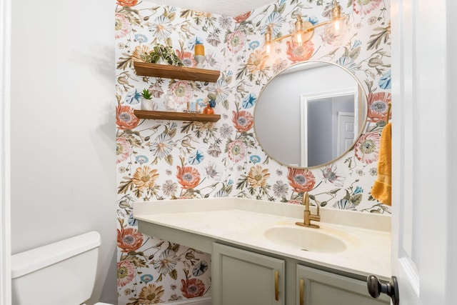 544 Courtright Ct, Pickerington, OH 43147 - bathroom with wallpapered walls, toilet, and vanity