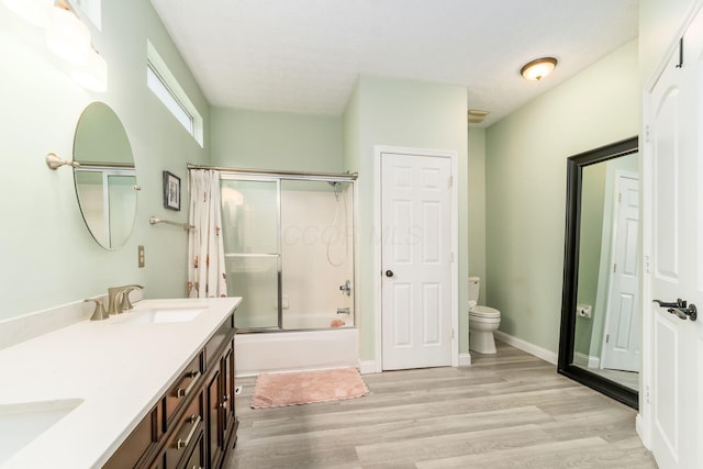 544 Courtright Ct, Pickerington, OH 43147 - bathroom with toilet, wood finished floors, shower / tub combo, and double vanity
