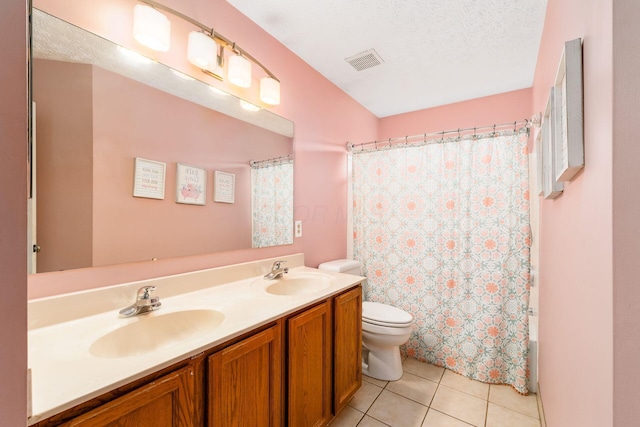 544 Courtright Ct, Pickerington, OH 43147 - bathroom featuring toilet, tile patterned floors, double vanity, and a textured ceiling