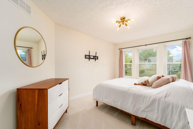 544 Courtright Ct, Pickerington, OH 43147 - bedroom featuring light colored carpet, baseboards, and a textured ceiling