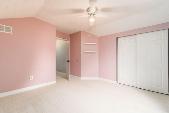 544 Courtright Ct, Pickerington, OH 43147 - unfurnished bedroom featuring vaulted ceiling, light carpet, baseboards, a closet, and ceiling fan