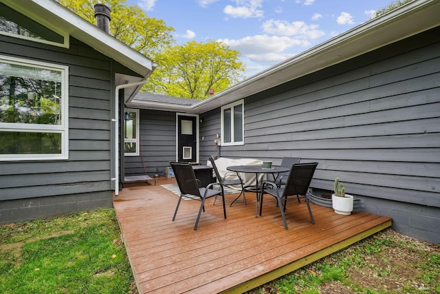 710 Cloverleaf Ct, Mansfield, OH 44904 - wooden deck featuring outdoor dining space