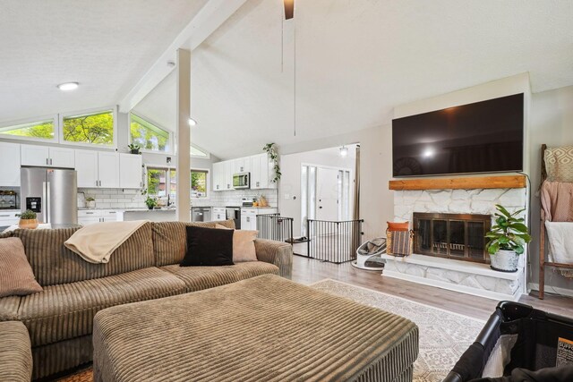 710 Cloverleaf Ct, Mansfield, OH 44904 - living area with light wood-type flooring and a fireplace