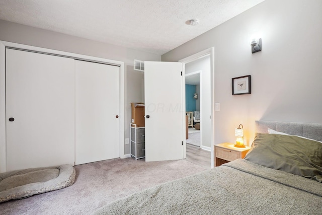 710 Cloverleaf Ct, Mansfield, OH 44904 - bedroom featuring carpet, a closet, and baseboards