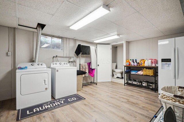 710 Cloverleaf Ct, Mansfield, OH 44904 - washroom with wood finished floors and washer and clothes dryer