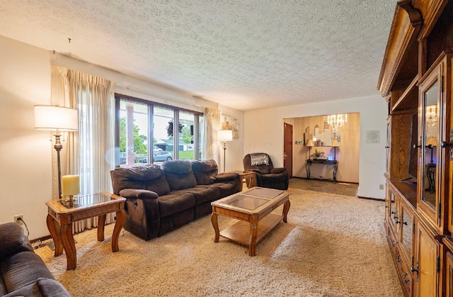 300 Stockbridge Rd, Columbus, OH 43207 - living area with a textured ceiling, a chandelier, light carpet, and baseboards