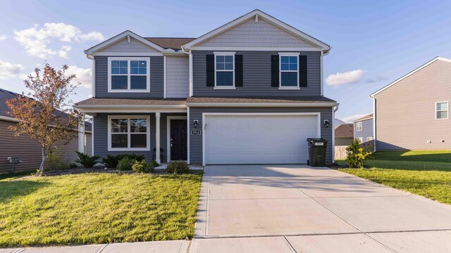 5914 Damsel Dr, Columbus, OH 43232 - view of front facade featuring driveway, a front yard, and an attached garage