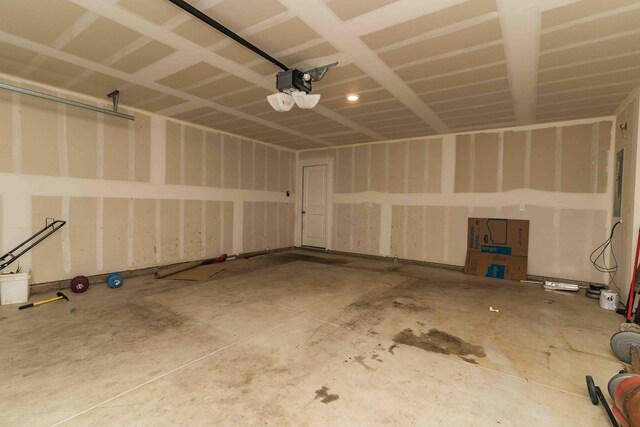 5914 Damsel Dr, Columbus, OH 43232 - garage featuring a garage door opener
