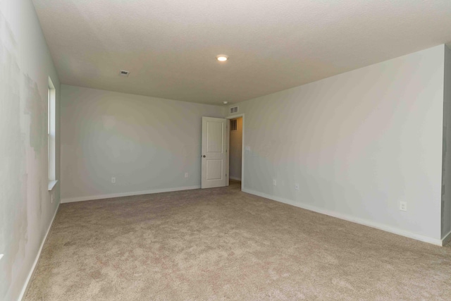 5914 Damsel Dr, Columbus, OH 43232 - carpeted empty room featuring baseboards and recessed lighting