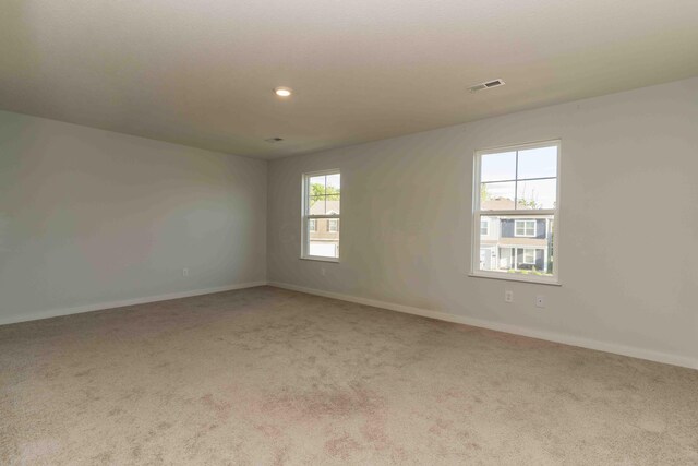 5914 Damsel Dr, Columbus, OH 43232 - carpeted empty room featuring baseboards and recessed lighting