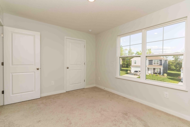5914 Damsel Dr, Columbus, OH 43232 - carpeted empty room featuring baseboards