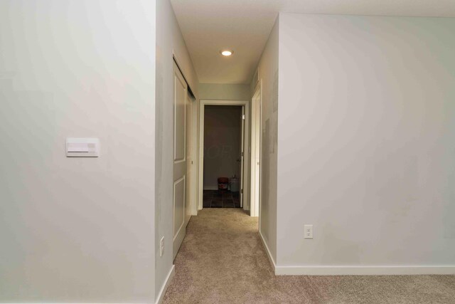 5914 Damsel Dr, Columbus, OH 43232 - hall featuring light colored carpet, recessed lighting, and baseboards