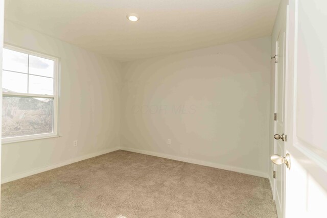 5914 Damsel Dr, Columbus, OH 43232 - unfurnished room featuring light colored carpet, baseboards, and recessed lighting