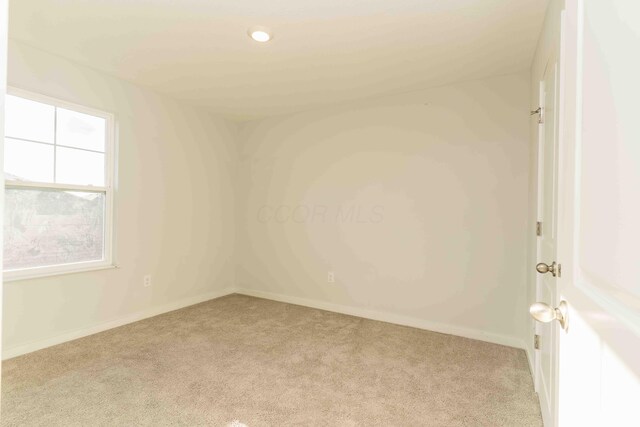 5914 Damsel Dr, Columbus, OH 43232 - spare room with light carpet and baseboards