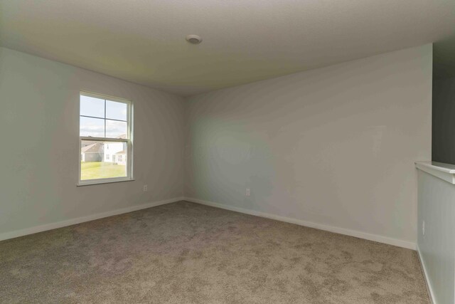 5914 Damsel Dr, Columbus, OH 43232 - carpeted spare room featuring baseboards