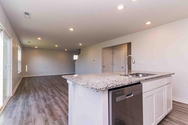 5914 Damsel Dr, Columbus, OH 43232 - kitchen with dishwasher, a sink, recessed lighting, wood finished floors, and baseboards