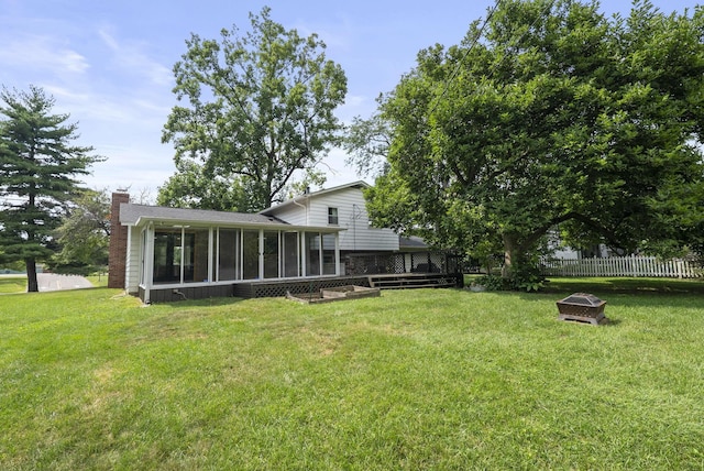 4200 Rudy Rd, Columbus, OH 43214 - view of yard featuring an outdoor fire pit and a sunroom