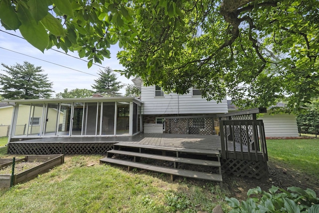 4200 Rudy Rd, Columbus, OH 43214 - wooden terrace featuring a sunroom, a garden, and a lawn