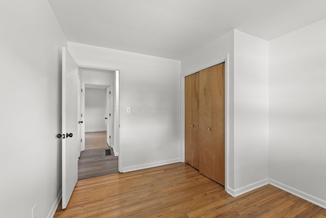 4200 Rudy Rd, Columbus, OH 43214 - unfurnished bedroom featuring light wood-style flooring and a closet