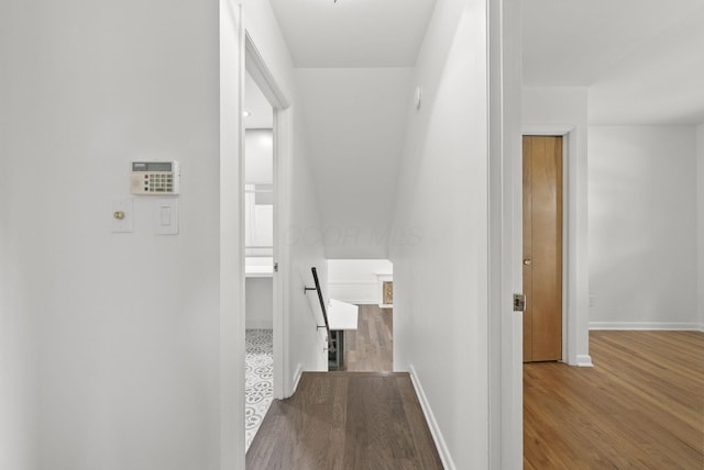 4200 Rudy Rd, Columbus, OH 43214 - hall featuring dark wood finished floors and baseboards