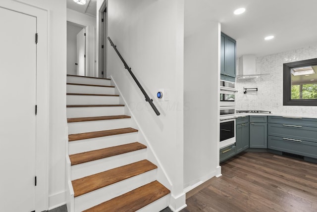 4200 Rudy Rd, Columbus, OH 43214 - stairs with wood finished floors and recessed lighting