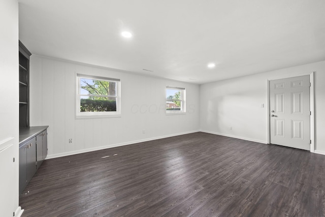 4200 Rudy Rd, Columbus, OH 43214 - unfurnished living room with dark wood finished floors and recessed lighting