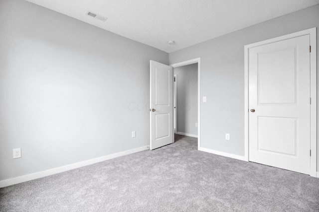 294 Shady Hollow Dr, Commercial Point, OH 43116 - unfurnished bedroom featuring carpet flooring and baseboards