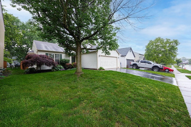 1427 Trabue Woods Blvd, Columbus, OH 43228 - view of front facade featuring asphalt driveway and a front lawn