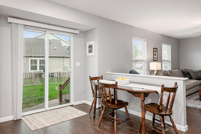 118 Firestone Dr, Delaware, OH 43015 - dining space with dark wood finished floors and baseboards