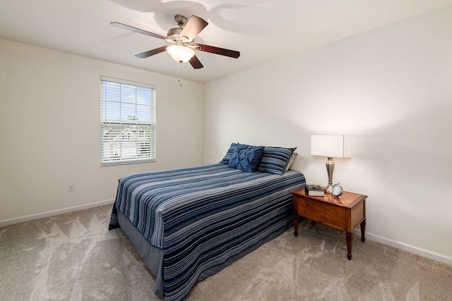 118 Firestone Dr, Delaware, OH 43015 - carpeted bedroom with baseboards and ceiling fan