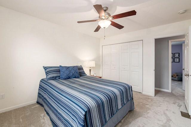 118 Firestone Dr, Delaware, OH 43015 - carpeted bedroom featuring a closet, baseboards, and a ceiling fan