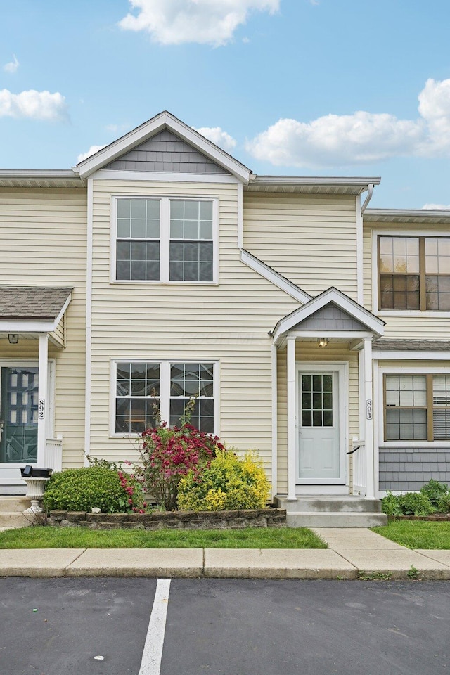 894 Noddymill Ln E Unit 28E, Columbus, OH 43085 - view of property featuring uncovered parking