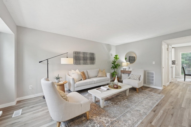 894 Noddymill Ln E Unit 28E, Columbus, OH 43085 - living area with light wood finished floors and baseboards