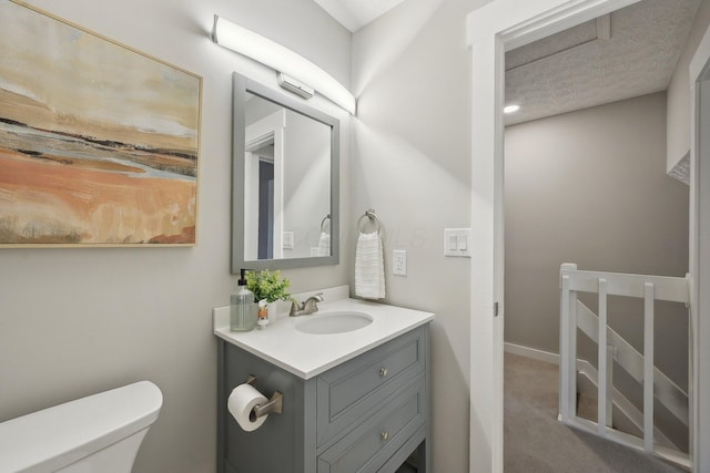 894 Noddymill Ln E Unit 28E, Columbus, OH 43085 - half bath featuring vanity, toilet, and baseboards