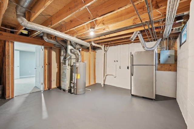 894 Noddymill Ln E Unit 28E, Columbus, OH 43085 - unfinished basement featuring freestanding refrigerator, water heater, electric panel, heating unit, and concrete block wall