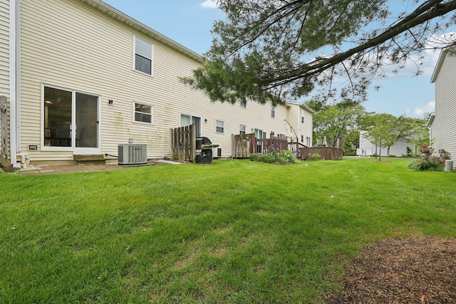 894 Noddymill Ln E Unit 28E, Columbus, OH 43085 - rear view of house with a yard and cooling unit