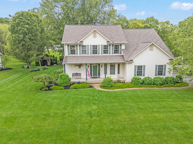 6962 Whitetail Ln, Westerville, OH 43082 - traditional-style home with covered porch, a shingled roof, and a front yard